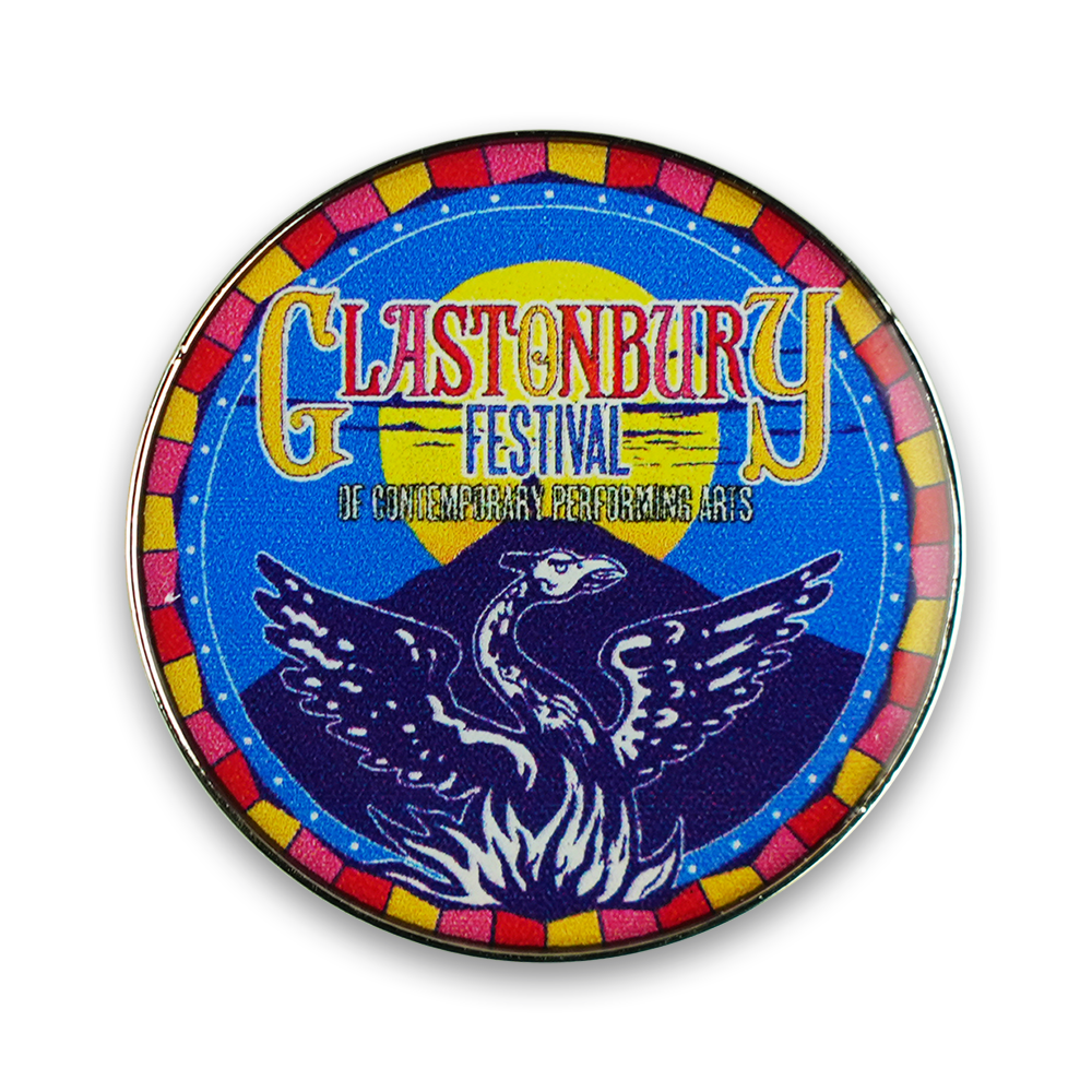 Colorful circular badge for the Glastonbury Festival featuring a phoenix-like bird rising from flames.