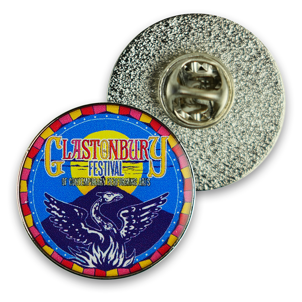 Colorful enamel pin featuring the Glastonbury Festival logo with a phoenix design.